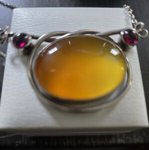 Elegant Sterling Silver and Amber Pendant